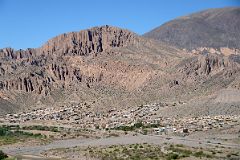 23 The Old Tilcara Town Lies Below Eroded Colourful Hills To The Southwest From Archaeologists Monument At Pucara de Tilcara In Quebrada De Humahuaca